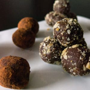 Gluten free, vegan chocolate orange truffles. Nut coated gluten free, vegan chocolate orange truffles. From FriFran