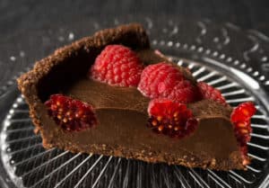 Slice of Chocolate, Hazelnut and Raspberry Gluten Free, Vegan Torte